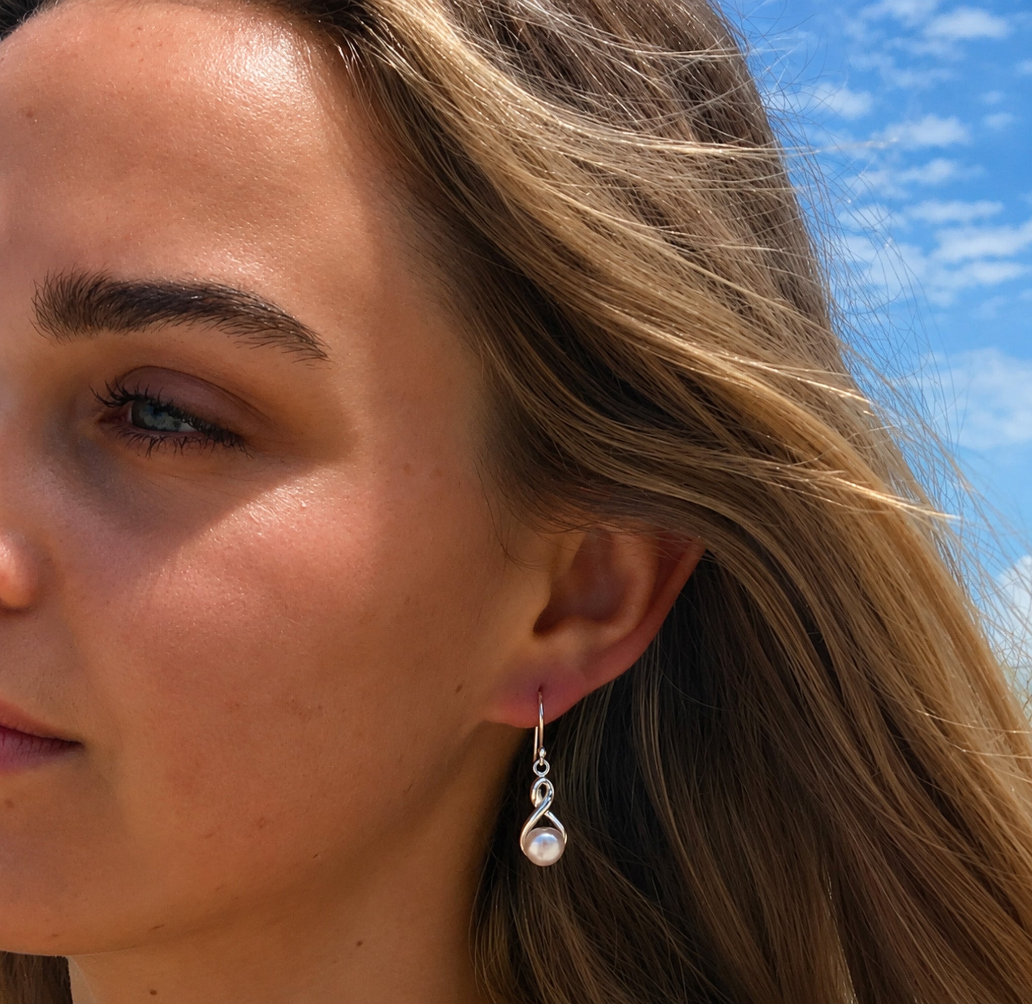 infinity sterling silver hook earrings with freshwater pearl designe din broome western australia