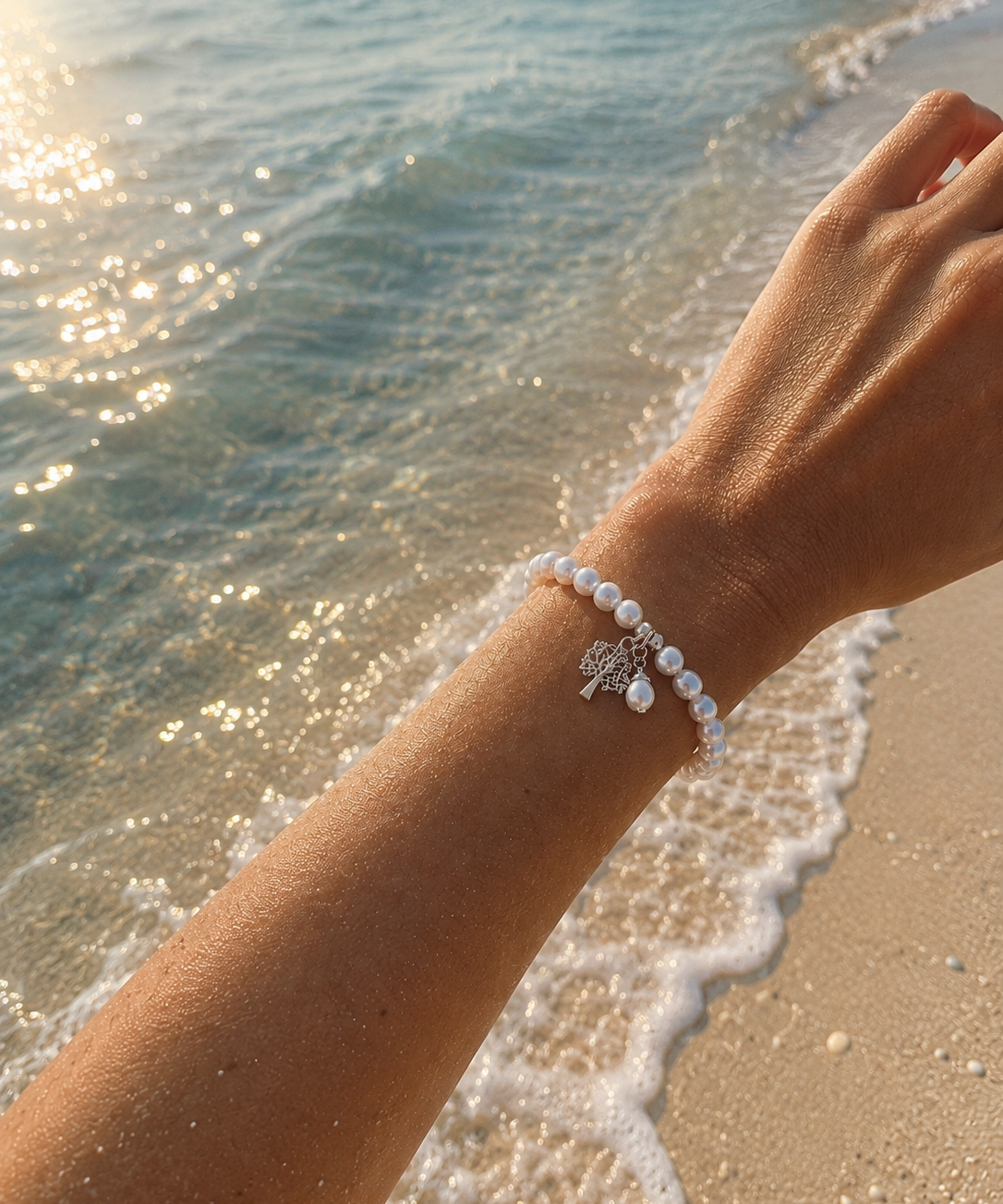 Kimberley Boab Pearl Silk Knot Adjustable Bracelet featuring genuine freshwater pearls, hand-knotted silk and sterling silver Boab tree charm.
