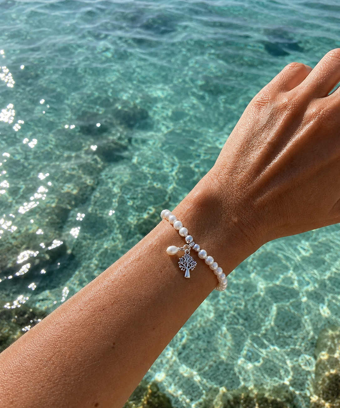 Kimberley Boab Pearl Stretch Bracelet with genuine freshwater pearls and sterling silver Boab tree charm inspired by the Kimberley region of Western Australia.