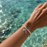 Kimberley Boab Pearl Stretch Bracelet with genuine freshwater pearls and sterling silver Boab tree charm inspired by the Kimberley region of Western Australia.