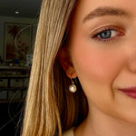 elegant pearl earrings in gold