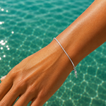 Minimalist Ocean Current Bracelet Silver crafted from 925 sterling silver with a delicate adjustable chain and polished silver finish.