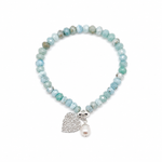 Ocean Hearts Larimar Stretch Bracelet featuring genuine Larimar gemstones, freshwater pearl charm and sterling silver heart charm.