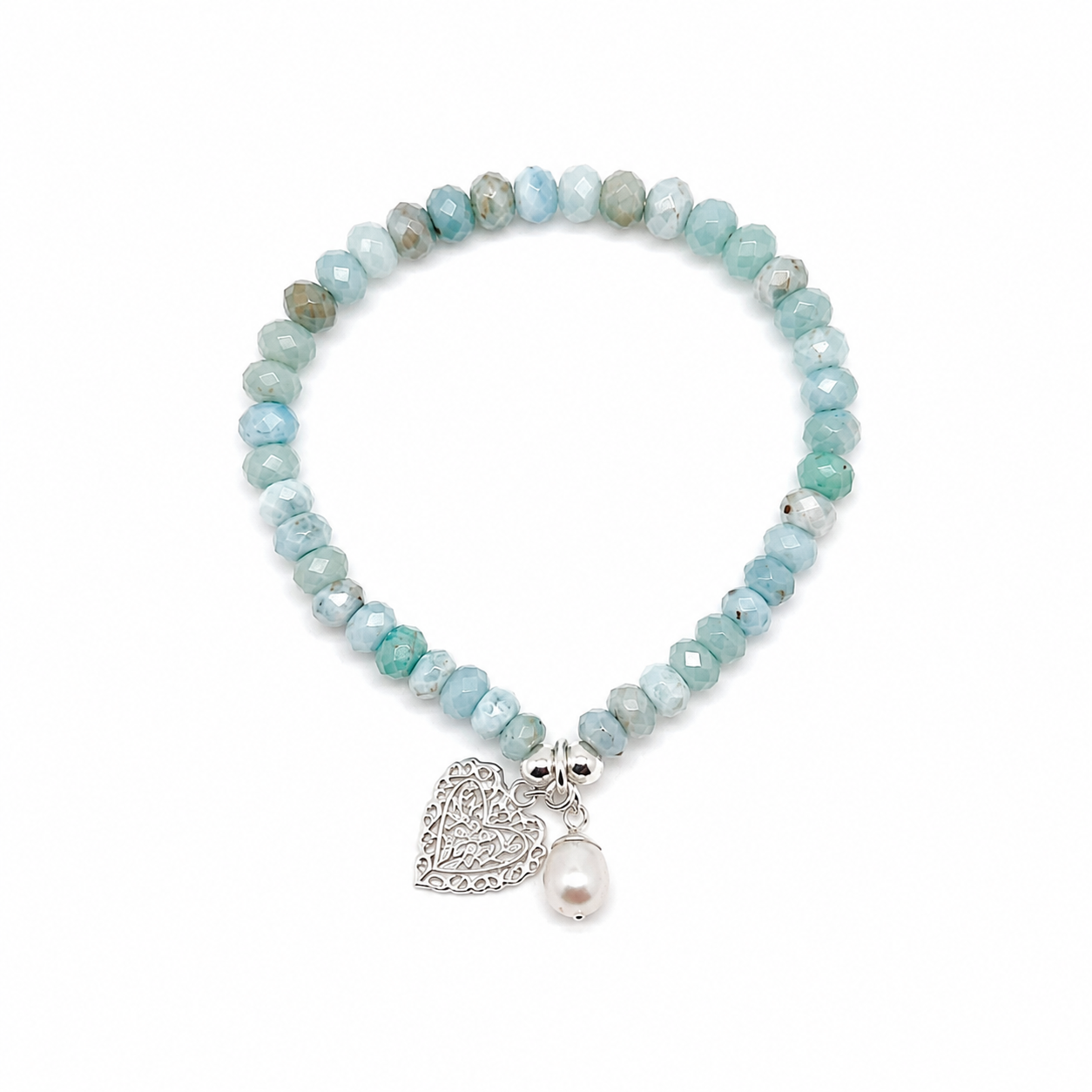 Ocean Hearts Larimar Stretch Bracelet featuring genuine Larimar gemstones, freshwater pearl charm and sterling silver heart charm.