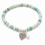 Ocean Hearts Larimar Stretch Bracelet featuring genuine Larimar gemstones, freshwater pearl charm and sterling silver heart charm.