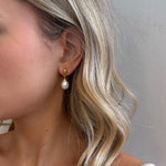 large pearl drop earrings in gold