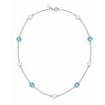 Close-up of Ocean Dreams silver necklace with pale blue topaz gemstones and white freshwater pearls