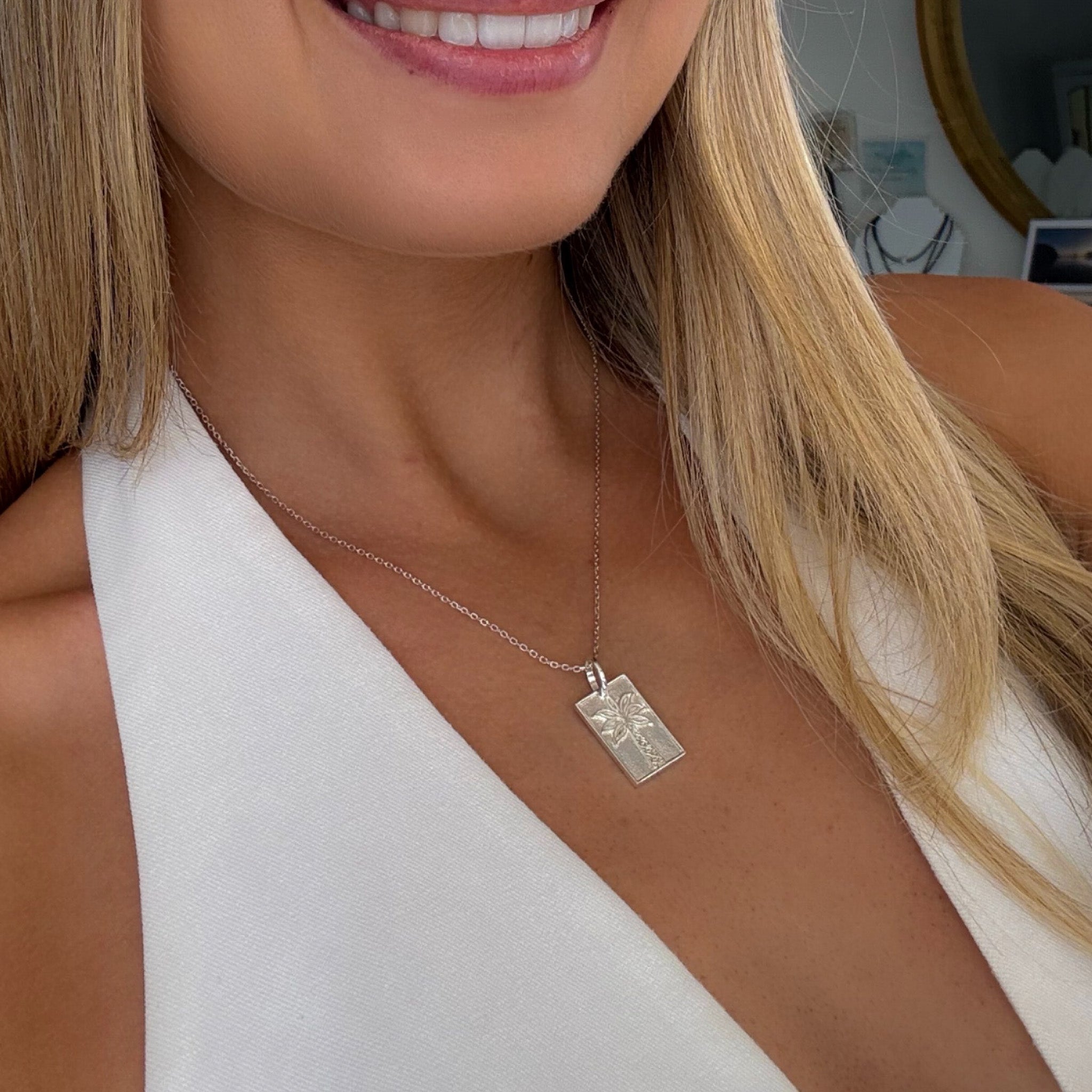 Palm tree pendant necklace in solid sterling silver worn beachy boho style Australian jewellery
