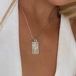 Sterling silver palm tree pendant necklace worn model coastal Australian jewellery Broome design