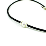 pearl necklace on neoprene