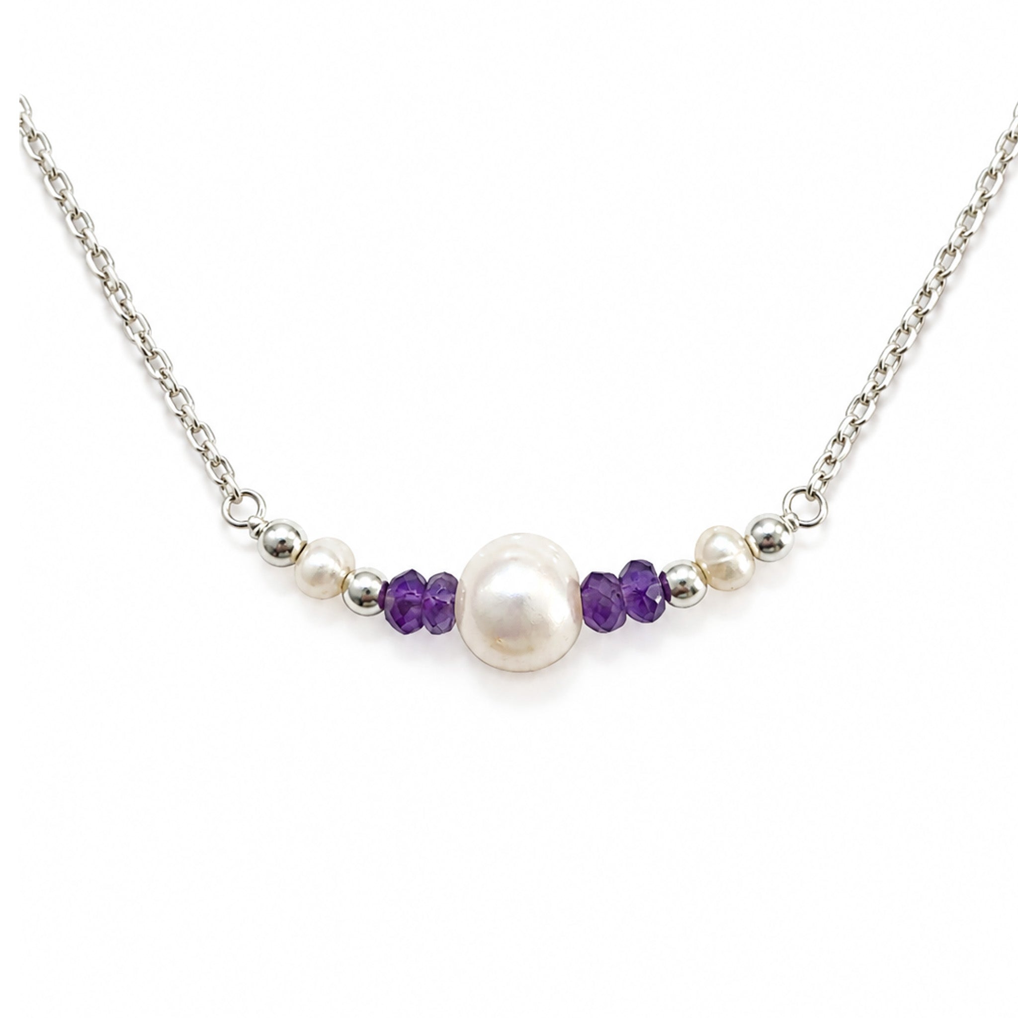 dainty silver chain necklace detailed with pearl and amethysts gemstones
