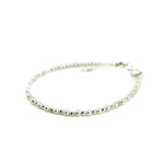 dainty neaded pearl and silver bracelet