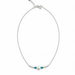 Close-up of 8mm freshwater pearl with 4mm faceted turquoise beads on sterling silver Sea Dreams Necklace