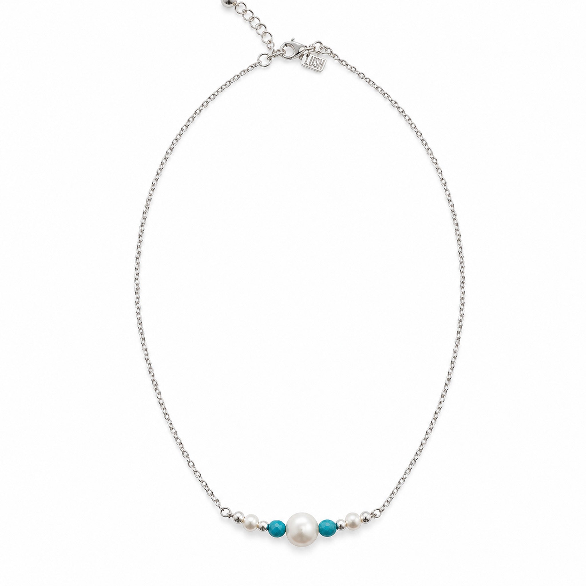 Close-up of 8mm freshwater pearl with 4mm faceted turquoise beads on sterling silver Sea Dreams Necklace