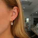 gold sleppers with cbubic zirconia gemstone