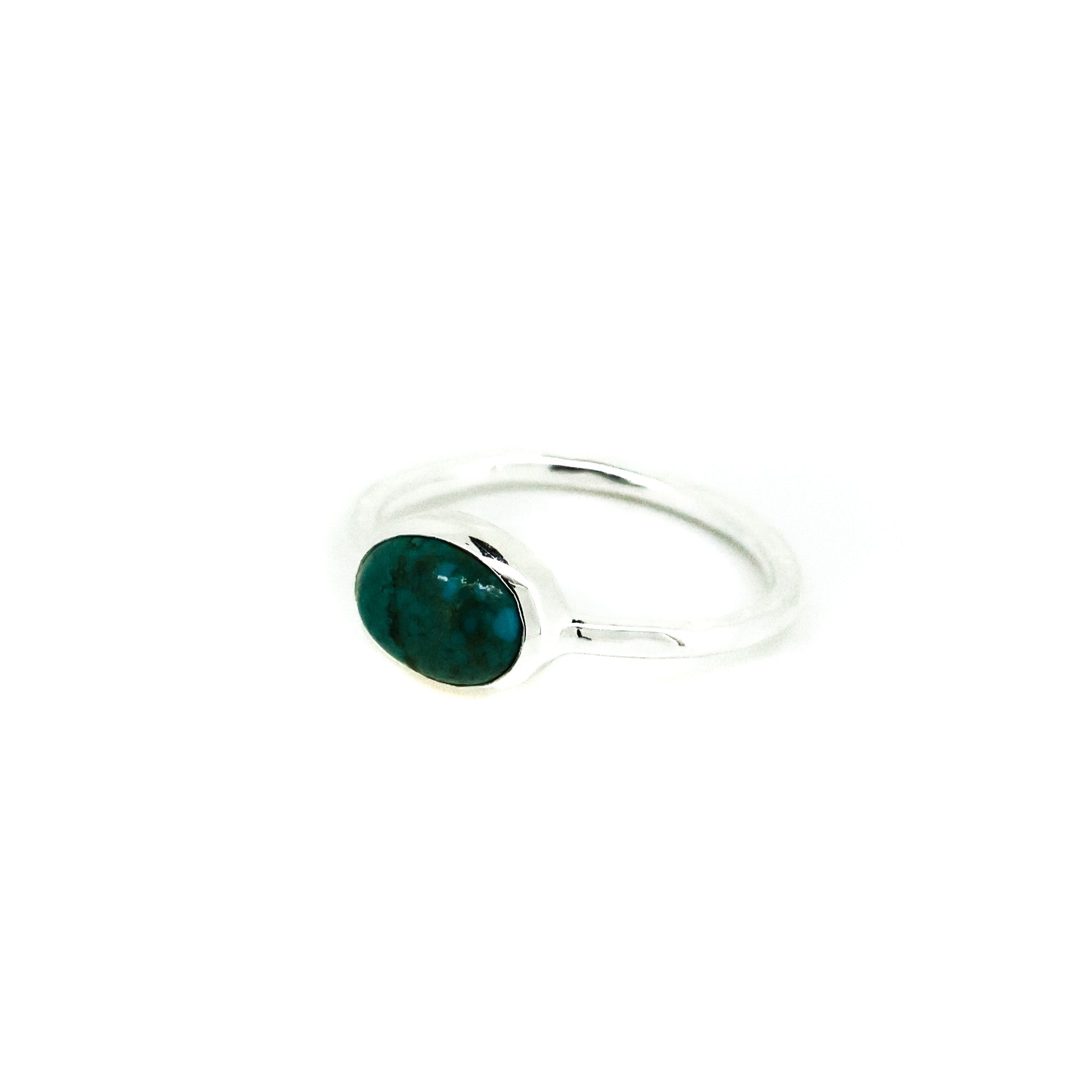 dainty oval turquoise ring in silver
