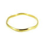 Wave Bangle Gold crafted in premium gold vermeil over sterling silver featuring an elegant polished wave-inspired coastal design.
