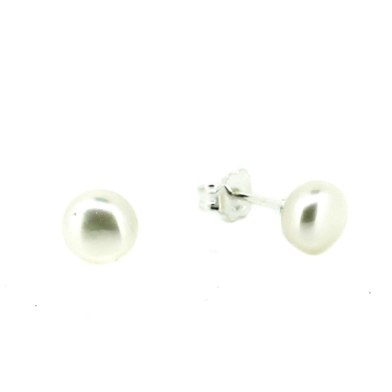 Pair of pearl stud earrings on a white background