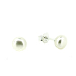 Pair of pearl stud earrings on a white background