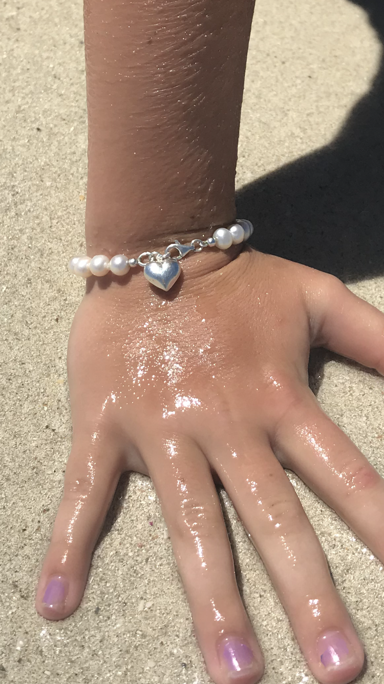 girls pearl bracelet with sterling silver heart charm 