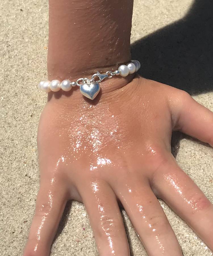girls pearl bracelet with sterling silver heart charm 