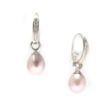 Sterling silver pink pearl earrings with sparkling star-inspired detailing designed in Broome Australia
