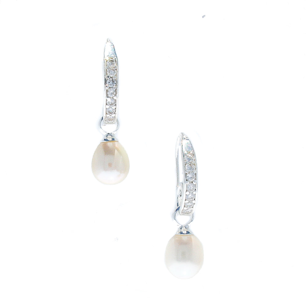 A pair of white pearl earrings with sterling silver hooks and cubic zirconia details.