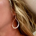 Boho Pearl Loop earrings in 925 sterling silver with hammered open loop and freshwater pearls designed in Broome Western Australia
