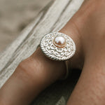 sterling silver ring with intricate details on top with cnetral pearl designed by lush deisgns jewellery broome