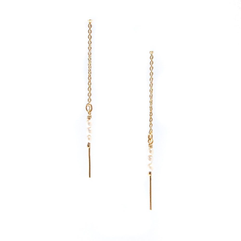 Rice Pearl Threads Gold featuring genuine freshwater rice pearls suspended on fine gold vermeil thread earrings over 925 sterling silver.
