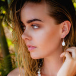 Mother of pearl dew drop shaped large hook silver earrings