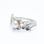 frangipani flower ring with pearl