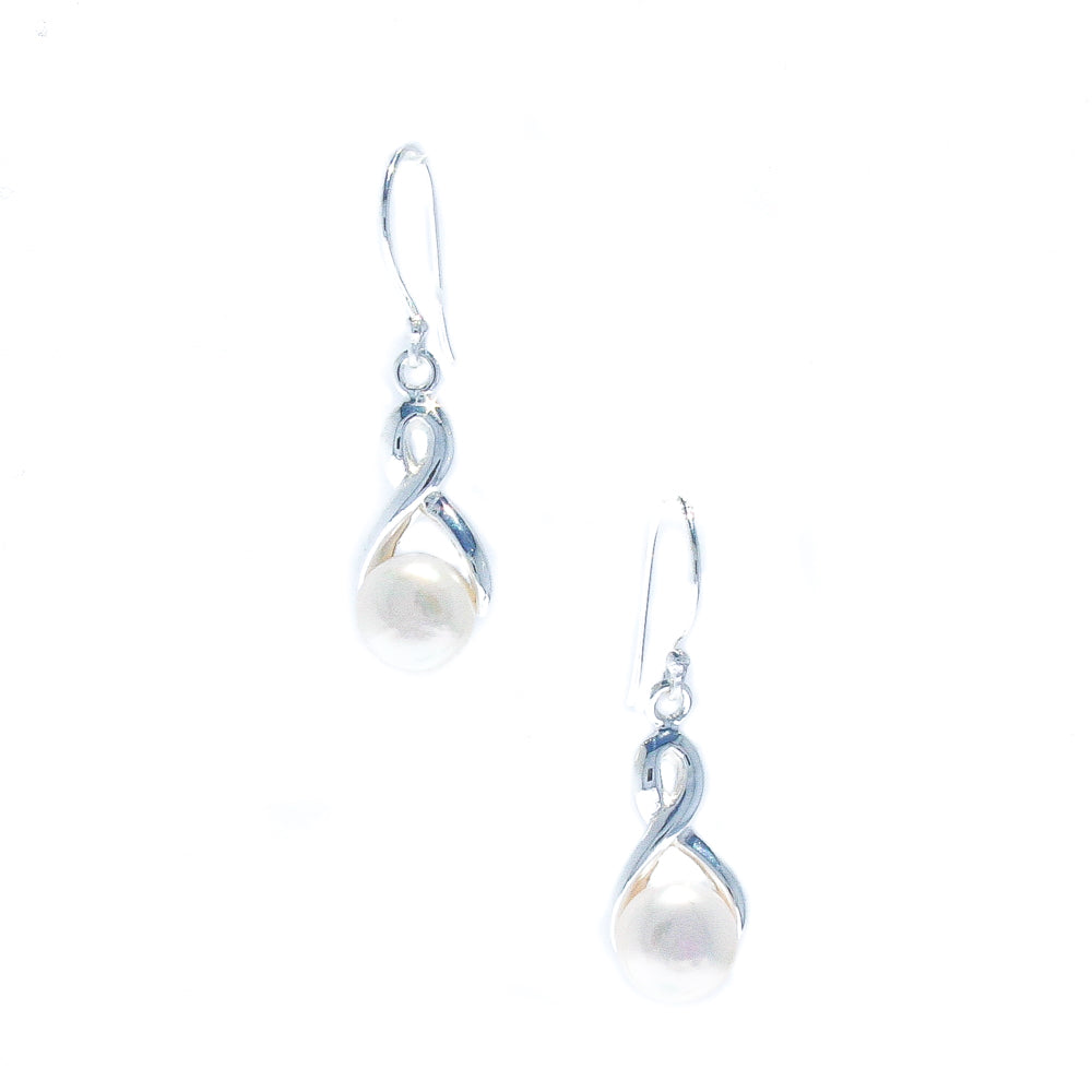 A pair of silver hook earrings featuring a swirl design with a central pearl, suspended from a small loop.