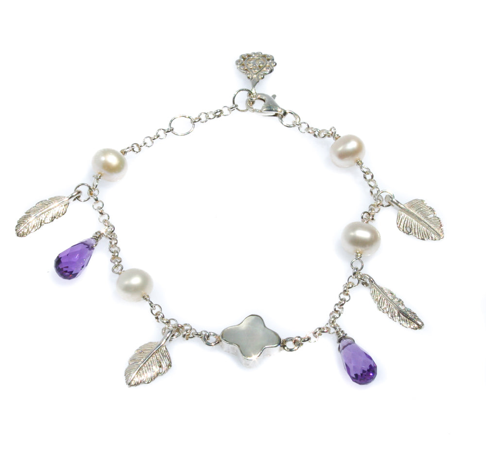 A bracelet featuring silver-colored beads, white pearls, purple amethyst drops, and metallic feather charms, with an adjustable clasp.