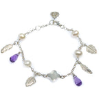 A bracelet featuring silver-colored beads, white pearls, purple amethyst drops, and metallic feather charms, with an adjustable clasp.