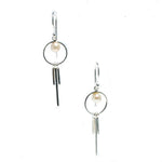 A pair of silver-colored earrings featuring freshwater pearl details, suspended from small circular hooks.