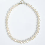 PEARL NECKLACE INDIVIDUALLY HAND KNOTTED ON SILK WITH STERLING SILVER CLASP