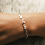 dainty silver chain bracelet with arrow design and silver detail