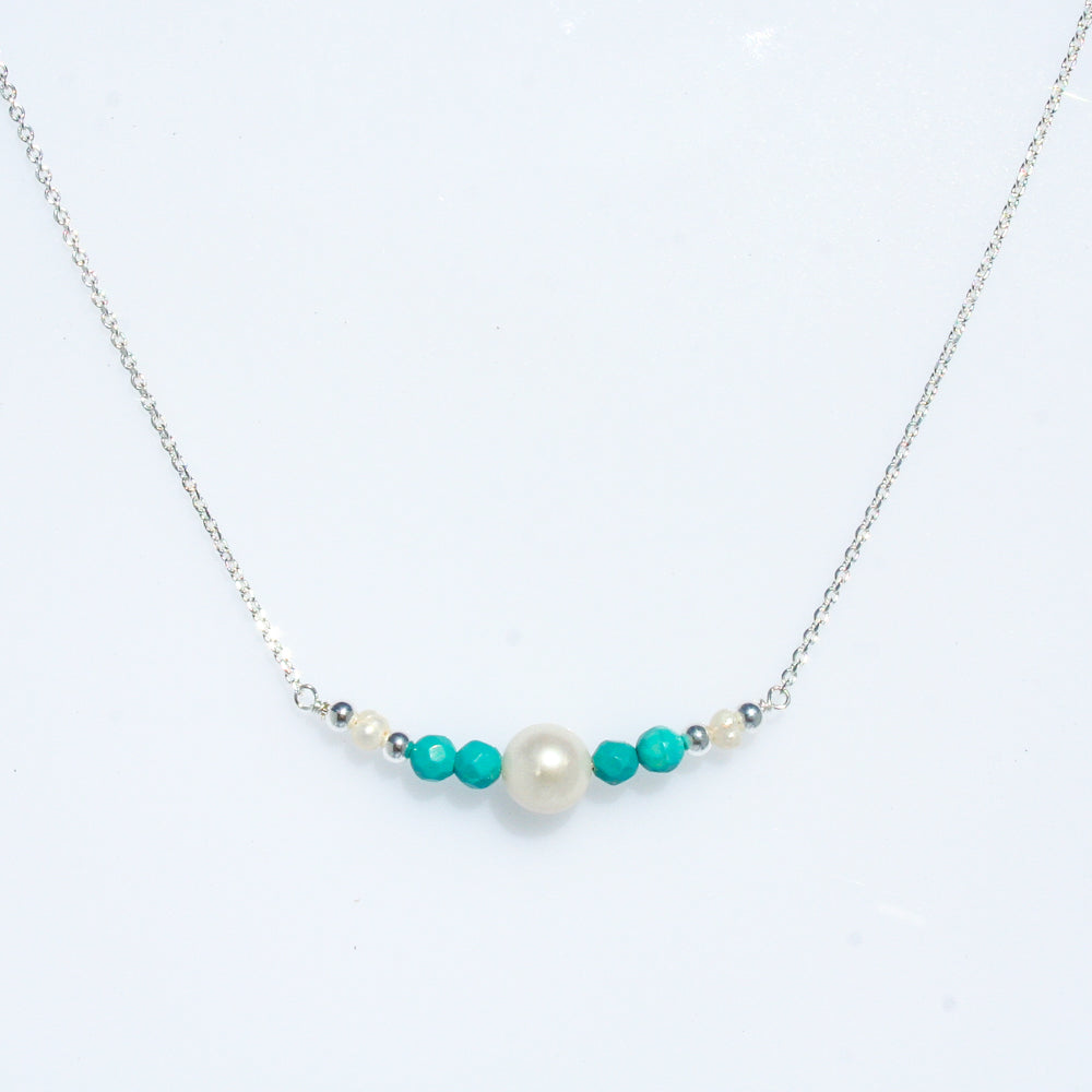 Sea Dreams pearl necklace with blue apatite gemstones and freshwater pearls in sterling silver