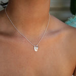 dainty sterling silver necklace with pearl, labradorite gemstone and silver feather