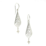 A pair of sterling silver drop earrings with intricate designs and fresh water pearl details at the bottom, hooks for attachment are visible.