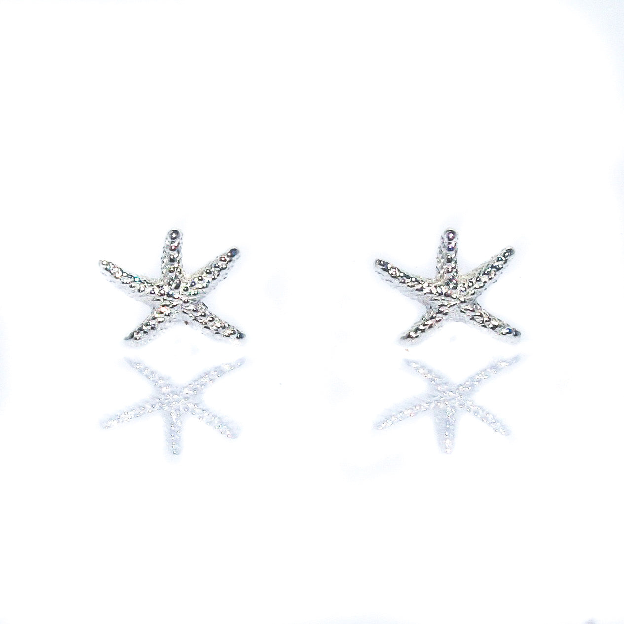 Sterling silver seastar stud earrings inspired by coastal Australian beach style designed in Broome Western Australia