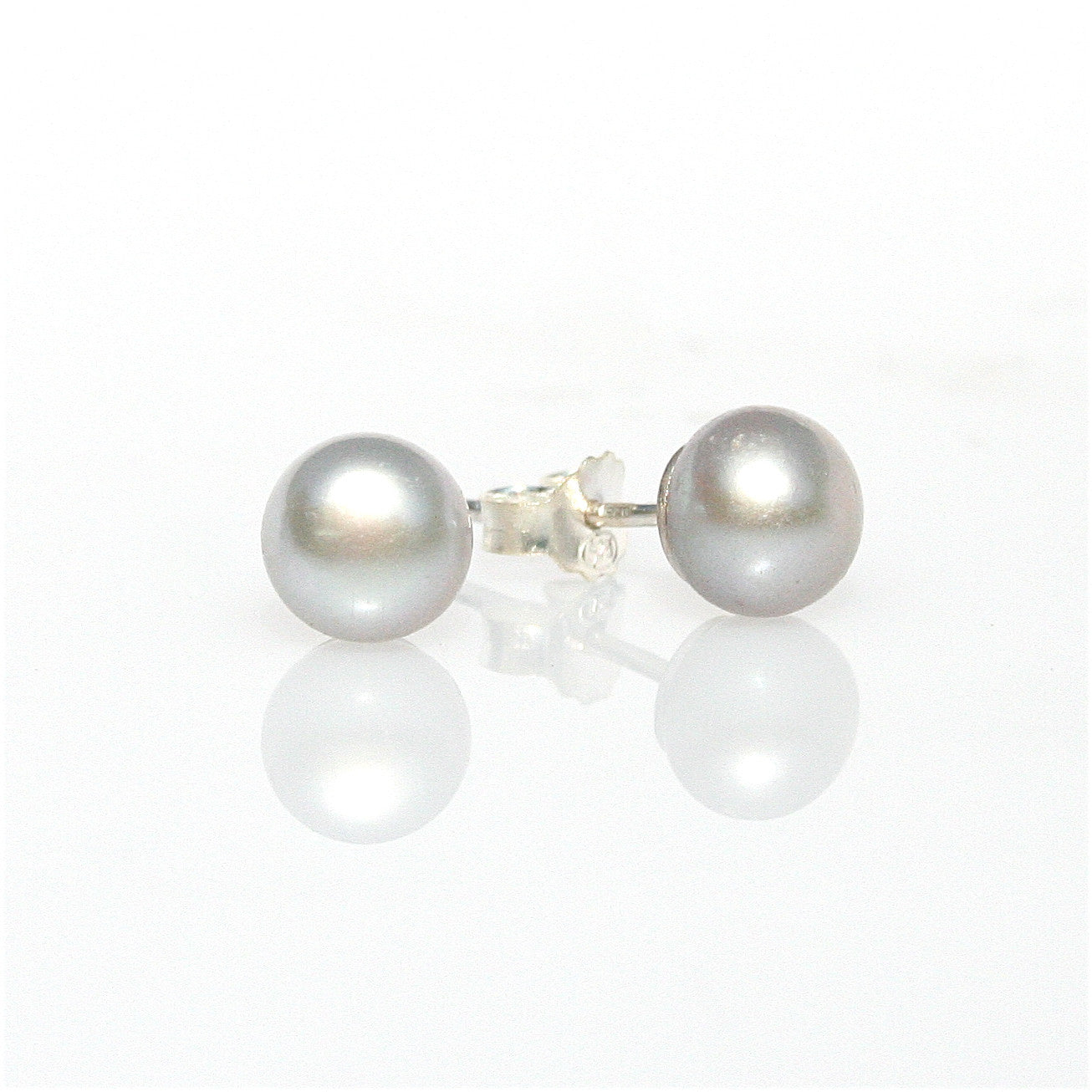 A pair of silver freshwater silver pearl 8mm stud earrings 