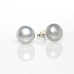 A pair of silver pearl 10mm stud earrings set in sterling silver 