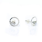 Dainty pearl studs with swirl detailing 