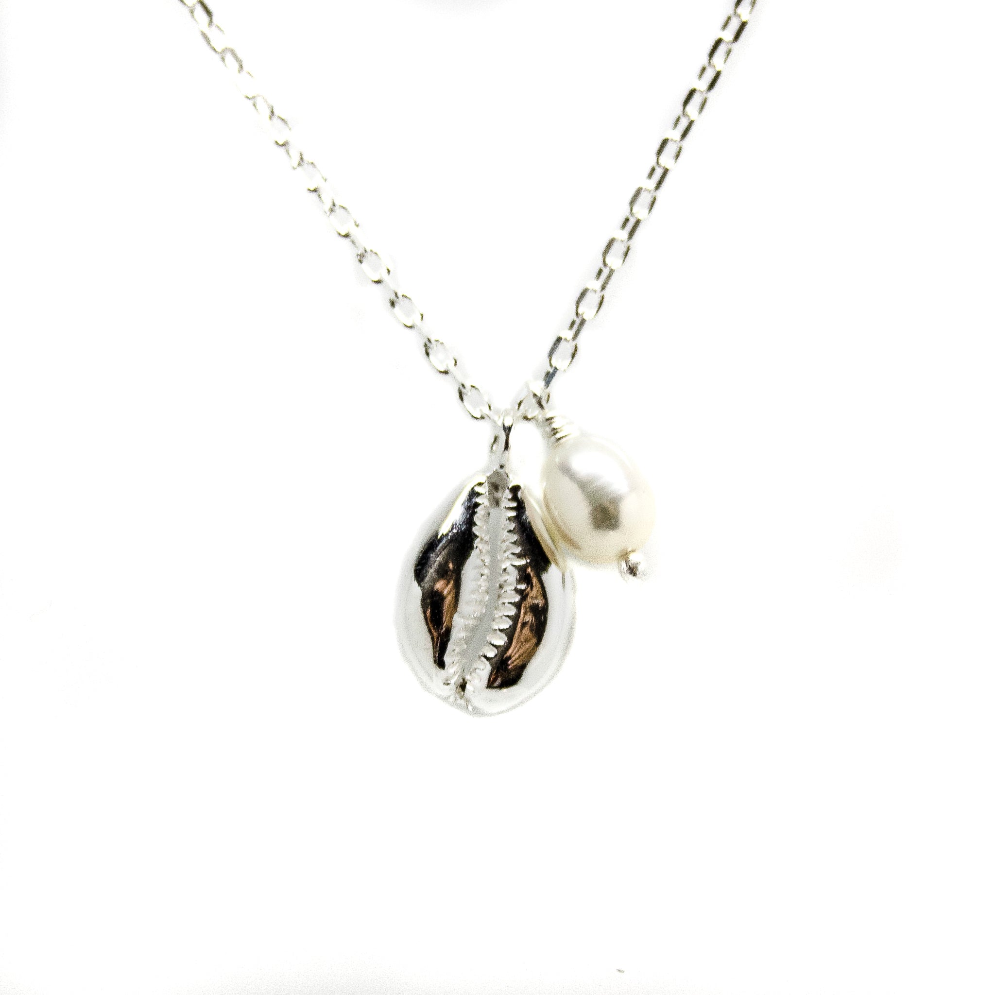 Cowrie Shell Pearl Necklace in 925 sterling silver featuring genuine freshwater pearls and a cowrie shell pendant