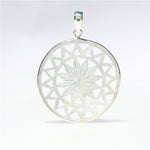 Mother of Pearl Flower Pendant crafted in sterling silver featuring genuine iridescent mother of pearl petals in a delicate floral design.