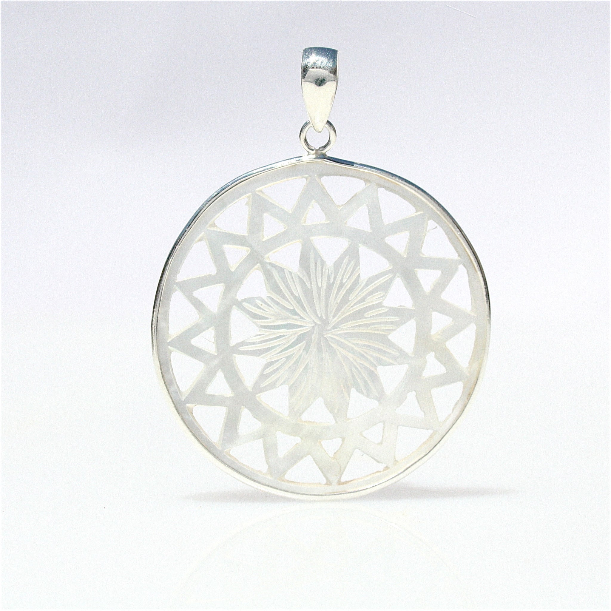 Mother of Pearl Flower Pendant crafted in sterling silver featuring genuine iridescent mother of pearl petals in a delicate floral design.