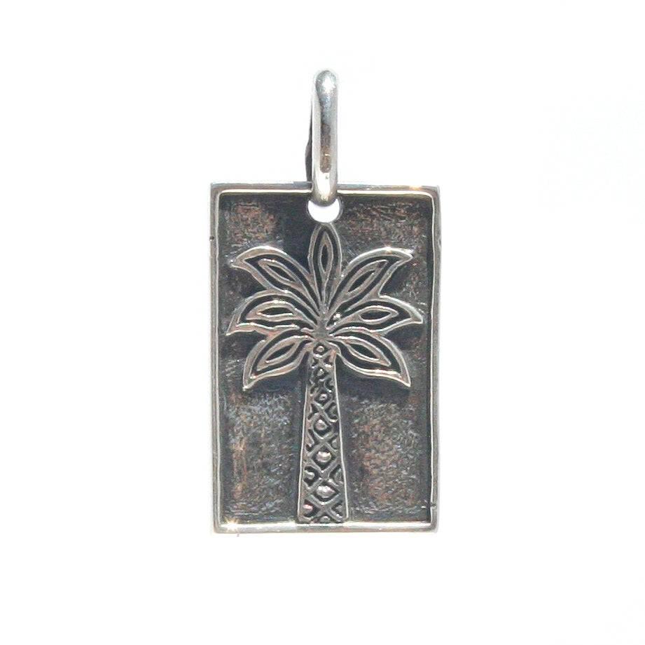 Sterling silver palm tree pendant necklace with Broome coordinates worn coastal Australian jewellery