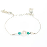dainty silver pearl tassel bracelet with turquoise detail